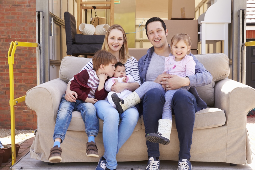 Happy Family On A Couch — Removalist in Brisbane, QLD