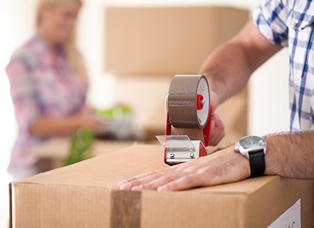 Couple Packing Boxes — Removalist in Brisbane, QLD