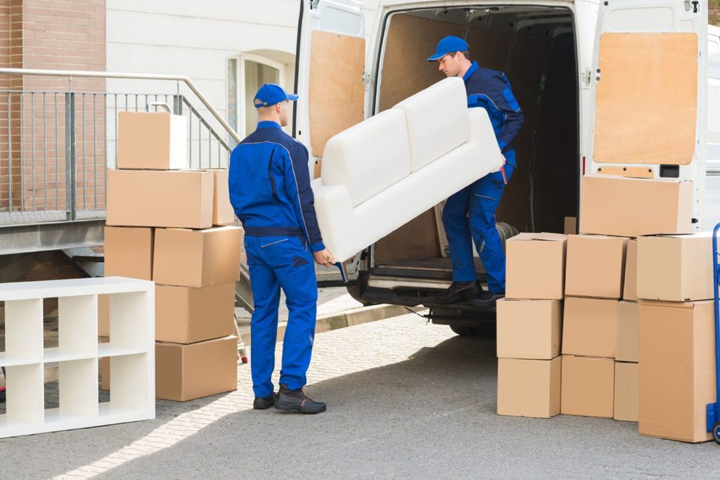 Employees Carrying Sofa — Removalist in Campbelltown NSW 2560